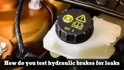 How do you test hydraulic brakes for leaks?